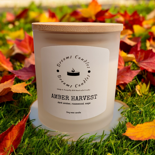 Amber Harvest candle in warm amber glass, with earthy, autumn-inspired scent for cozy seasonal ambiance